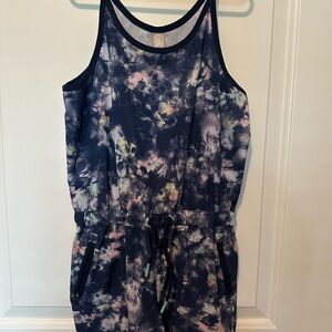 Athleta Girl 8-10 romper with two zipper pockets and two back pockets
